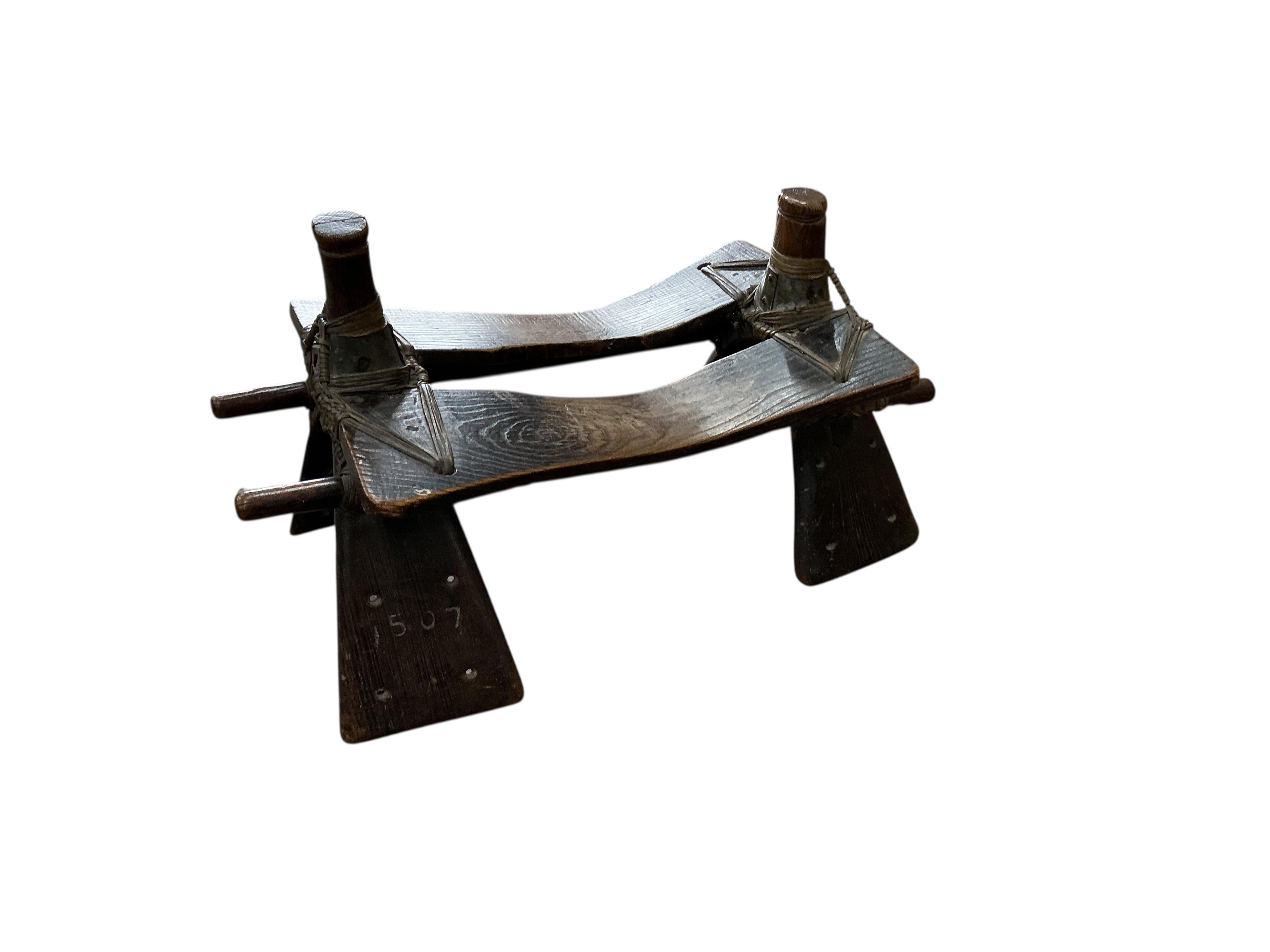 A camel's saddle, width 78cm, depth 49cm, height 46cm